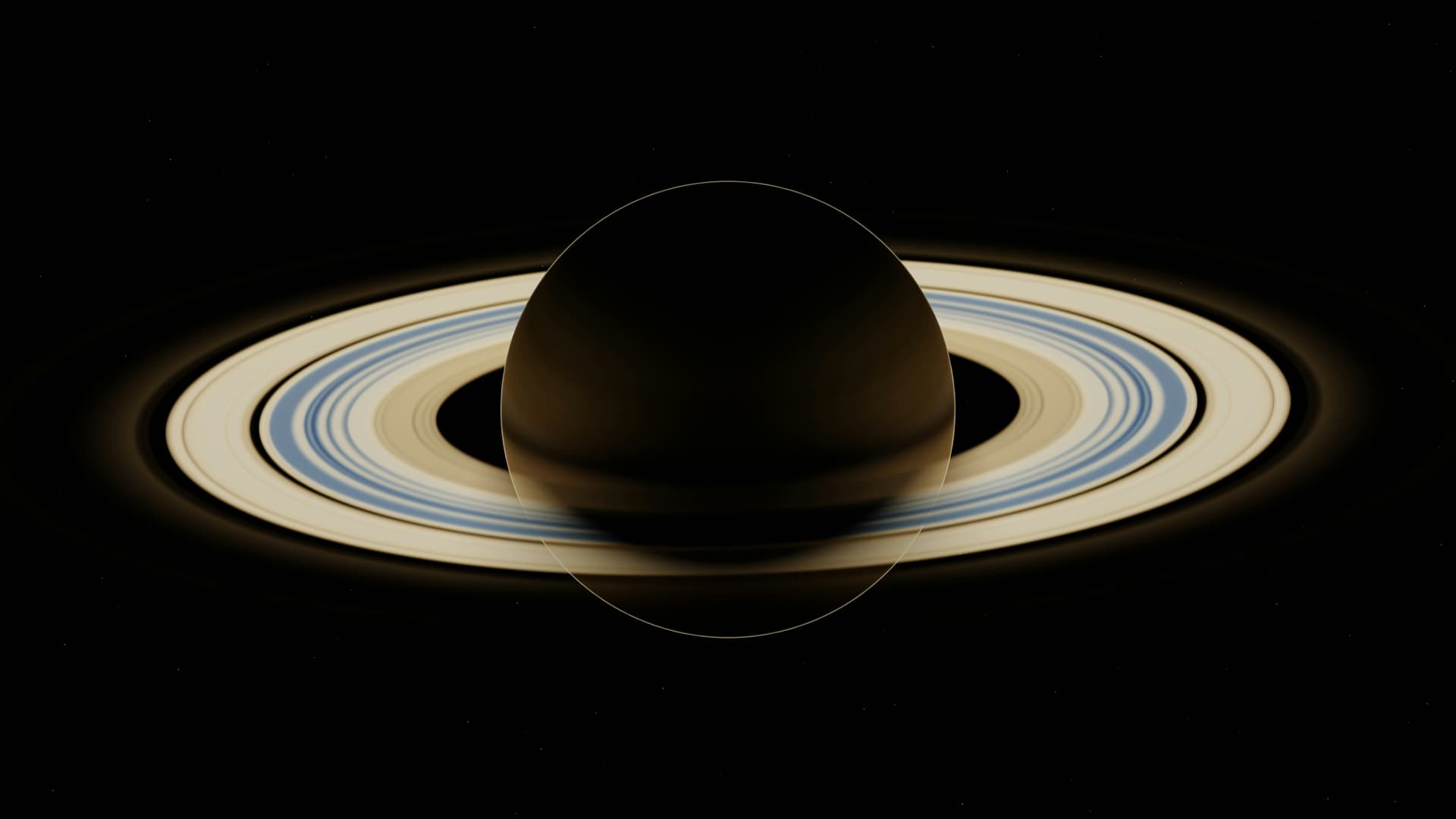 Saturn planet with rings glowing against a deep space background